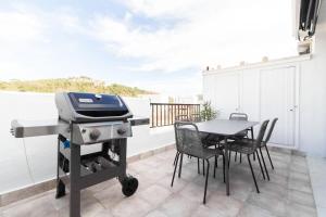 Fotografia z galérie ubytovania BRAND NEW PENTHOUSE TERRACE BBQ WIFI MODERN MALAGA v destinácii Málaga