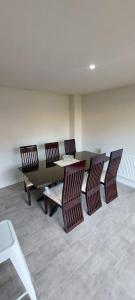 a conference room with a table and chairs and a table and chairsktop at Guest Village in Hull