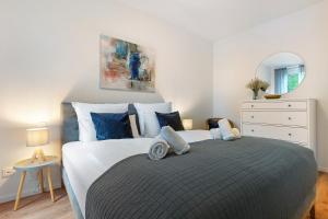 Ένα ή περισσότερα κρεβάτια σε δωμάτιο στο Km Style Apartments 3
