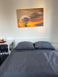 Postel nebo postele na pokoji v ubytování Genesis Apartments + 9 fotografií