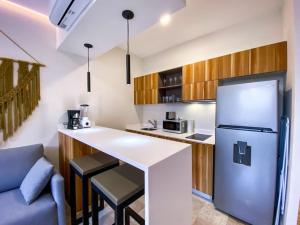 Una cocina o kitchenette en Excellent Studio in Aldea Zama with Pool, Gym, Wifi