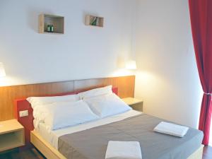 Postel nebo postele na pokoji v ubytování Bio Hotel Palermo