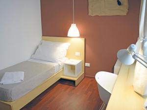 Postel nebo postele na pokoji v ubytování Bio Hotel Palermo