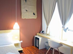 Postel nebo postele na pokoji v ubytování Bio Hotel Palermo