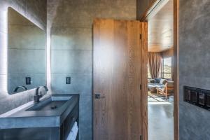 a bathroom with a sink and a mirror at Pause House- PM - your break in Joshua Tree in Joshua Tree +37 photos