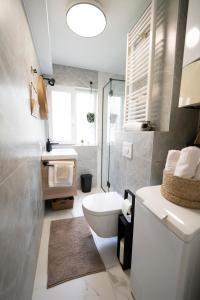 Koupelna v ubytování NO'EN'EL Apartment Zagreb + 24 fotografií