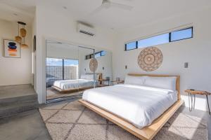 Katil atau katil-katil dalam bilik di Orion Minor - Spa and Soaking Tub with Park Views