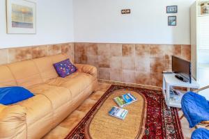 Posezení v ubytování Grifeu 10 Apartamento con terraza