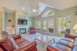 a living room with a couch and a table at Tidewater Golf Community 722 Teal Lake in North Myrtle Beach