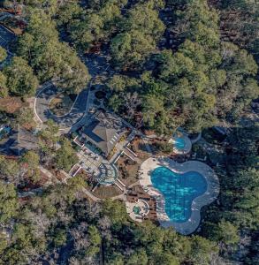 an aerial view of a resort with a swimming pool at Tidewater Golf Community 722 Teal Lake in North Myrtle Beach