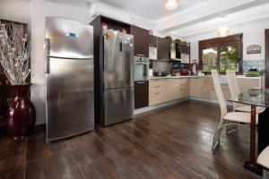 Kuchyň nebo kuchyňský kout v ubytování Villa Maria Luxury