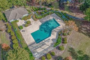 an overhead view of a swimming pool in a yard at Teal Lake 1413 in North Myrtle Beach