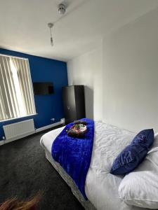 Postel nebo postele na pokoji v ubytování Quirky Oasis Queens