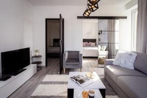 Телевизор и/или развлекательный центр в Apartament Skandynawia