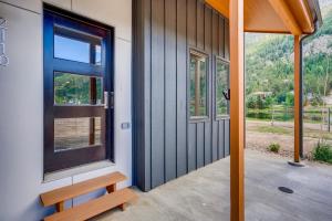 a door to a house with a window at Rambler's Retreat Sleeps 8 Lakefront View in Georgetown