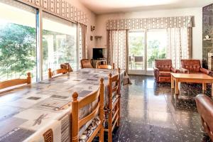 Posezení v ubytování Grifeu 14 Apartamento con terraza y jardín