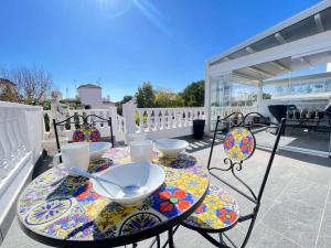A balcony or terrace at Lovely 3 Bedroom Villa with Com Pool LD502