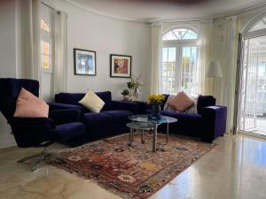 A seating area at Lovely 3 Bedroom Villa with Com Pool LD502