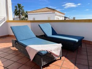 A seating area at Lovely 3 Bedroom Villa with Com Pool LD502