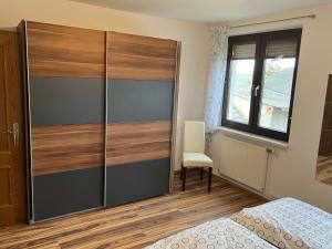 Una cama o camas en una habitación de Appartement Ferienwohnung LANG