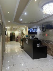 a lobby with a reception desk in a building at شقق ذوق الخيآل المخدومه الحبله in Abha