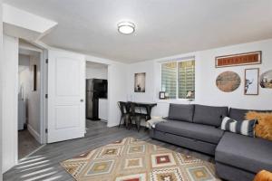 a living room with a couch and a table at #StayinMyDistrict Twin Falls Pendleton Chic Suite in Twin Falls