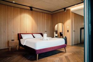 Ένα ή περισσότερα κρεβάτια σε δωμάτιο στο Designer Luxury Penthouse with dedicated concierge