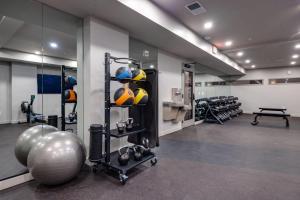 a room with a gym with balls and weights at Nashville - 635 7th Ave S Unit 412 in Nashville