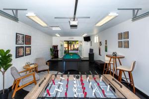 a room with a pool table and ping pong ball at Scottsdale - 15035 N 54th St in Phoenix
