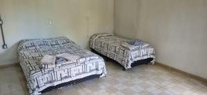 Cama o camas de una habitación en Pousada temática Estrada Real