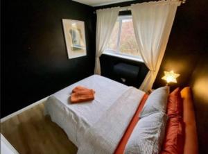Ένα ή περισσότερα κρεβάτια σε δωμάτιο στο K Suites - Park Grange Croft