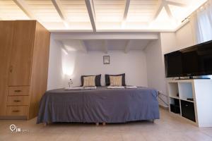 Ein Bett oder Betten in einem Zimmer der Unterkunft 'Alexander' Seaside House With View In Nea Makri