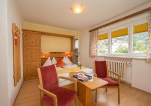 Posezení v ubytování Hotel Pension Hubertus