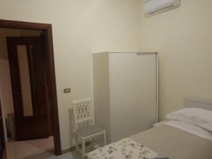 Letto o letti in una camera di Orchidea1