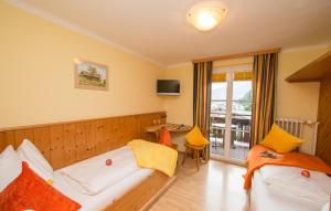 Postel nebo postele na pokoji v ubytování Hotel Pension Hubertus