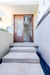 Φωτογραφία από το άλμπουμ του Live like a local In The Heart of Moffat Beach σε Καλούντρα