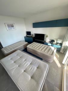 Postel nebo postele na pokoji v ubytování Appartement 2 pièces vue mer proche Monaco
