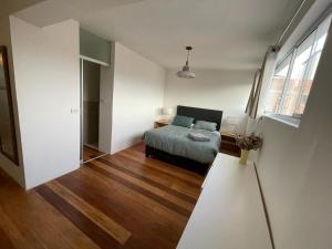 Postel nebo postele na pokoji v ubytování Illa B&B