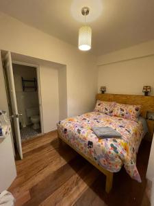 Postel nebo postele na pokoji v ubytování Illa B&B