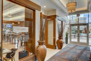 a store with two large vases in a room at MGM Signature-24-709 Strip View Jacuzzi Studio in Las Vegas