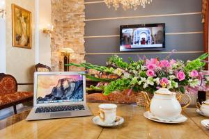 TV a/nebo společenská místnost v ubytování Conference Hotel Suputnyk