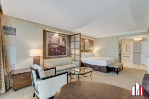 a hotel room with a bed and a living room at Signature 2Br3Ba balcony combo units 20-618 and 20 in Las Vegas +77 photos