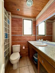 a bathroom with a toilet and a sink at Spanish style flat close to center in Alicante