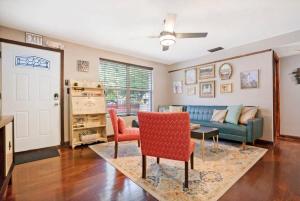 a living room with a couch and a table at Eclectic Beauty, Heart of Downtown St Aug in Saint Augustine