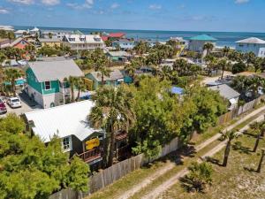 an aerial view of a small town with houses and the ocean at Marvelous Mermaid Bungalow, Dog-Friendly Upstairs Apt in Prime Vilano Beach in Saint Augustine