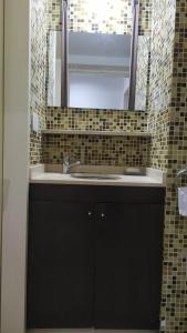 Vonios kambarys apgyvendinimo įstaigoje Caballito Unico Full y Excelente