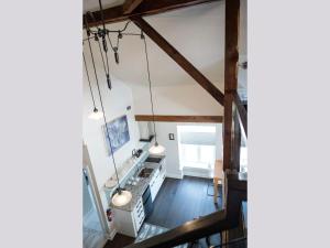 an overhead view of a kitchen with exposed beams at Kemptville Suites in Kemptville