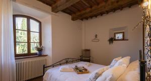 Posteľ alebo postele v izbe v ubytovaní Ca'Novae - Tuscany Farmhouse