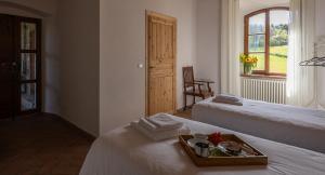 Posteľ alebo postele v izbe v ubytovaní Ca'Novae - Tuscany Farmhouse