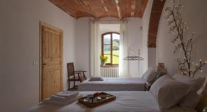 Кровать или кровати в номере Ca'Novae - Tuscany Farmhouse